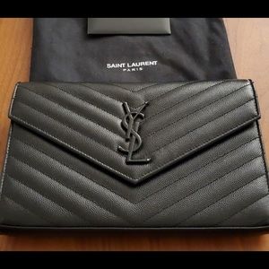 Lightly used all black YSL crossbody handbag